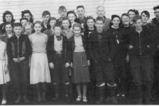 527: Group of 27 children. (circa 1950) [courtesy of Lorna Richardson] ** also see 526 **  Back-to-front, left-to-right,  Margie Norman (back), Beth Lambe (middle), Babe Ennis (front, white skirt);  Angela Ryan (back), Mary Finn (middle), Francis Barry (front);  Marie Ryan (back), Annie Norman (2nd from back, partially hidden), Madonna McCarthy (3rd  from back, blonde hair), Madonna Whelan (front, white skirt);  Gerard Lambe (back), Imelda Ryan (middle), Dave Ryan (front);  Paul McCarthy (back), Gwen Carroll (2nd from back), Noreen Ryan (3rd from back),  Mary Ennis (front); Camillus Dunphy (back), Teresa Whelan (middle, big smile),  Patrick Lambe (front); Mr. Denis Patrick Barry (back, schoolmaster), Marie Counsel, Kevin Ryan,  Betty Ennis (back), Thomas Barry (front), Adrian Ryan, Joseph Dunphy, Kevin Carroll.  - Francis Barry (of Thomas Barry &amp;amp; Catherine Corrigan)  - Thomas Barry (of Thomas Barry &amp;amp; Anne Dollimont)  - Gwen Carroll (of Michael Carroll &amp;amp; Josephine Barry)  - Kevin Carroll (of Michael Carroll &amp;amp; Josephine Barry)  - Marie Counsel (of Michael Counsel &amp;amp; Mary Anne Barry)  - Camillus Dunphy (of Thomas Dunphy &amp;amp; Anastasia Carroll)  - Joseph Dunphy (of Thomas Dunphy &amp;amp; Anastasia Carroll)  - Babe Ennis (of Vincent Ennis &amp;amp; Mary Carroll)  - Betty Ennis (of Vincent Ennis &amp;amp; Mary Carroll)  - Mary Ennis (of Vincent Ennis &amp;amp; Mary Carroll)  - Mary Finn (of Patrick Finn &amp;amp; Helena Hayward)  - Beth Lambe (of James Lambe &amp;amp; Catherine Rodgers)  - Gerard Lambe (of Peter Lambe &amp;amp; Anne Norman)  - Patrick Lambe (of Peter Lambe &amp;amp; Anne Norman)  - Madonna McCarthy (of James McCarthy &amp;amp; Mary Ellen Barry)  - Paul McCarthy (of Thomas McCarthy &amp;amp; Margaret Whelan)  - Annie Norman (of John Norman &amp;amp; Mary Farget)  - Margie Norman (of Charles Norman &amp;amp; Elizabeth Anne Barry)  - Adrian Ryan (of Albert Ryan &amp;amp; Catherine Nolan)  - Angela Ryan (of Michael Ryan &amp;amp; Petronella Whelan)  - David Ryan (of Jeremiah Ryan &amp;amp; Josephine Lambe)  - Imelda Ryan (of Jeremiah Ryan &amp;amp; Josephine Lambe)  - Kevin Ryan (of Albert Ryan &amp;amp; Catherine Nolan)  - Marie Ryan (of Joseph Ryan &amp;amp; Ursula Barry)  - Noreen Ryan (of Albert Ryan &amp;amp; Catherine Nolan)  - Madonna Whelan (of Leo Whelan &amp;amp; Elizabeth Bishop)  - Teresa Whelan (of Leo Whelan &amp;amp; Elizabeth Bishop)